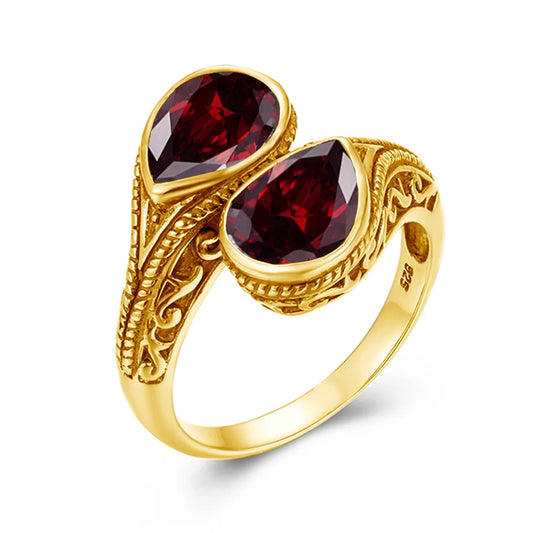 bague en or avec pierre rouge